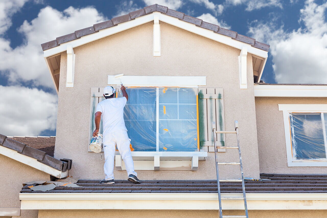 Damaged stucco and patch repair Stucco home being prepared for repair and painting in Los Angeles